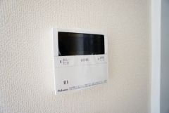 キッチン横からボタンひとつで操作が楽々。