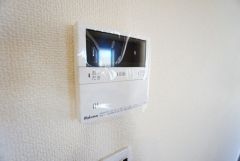 キッチン横からボタンひとつで操作が楽々。