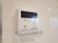 キッチン横からボタンひとつで操作が楽々。