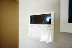 キッチン横からボタンひとつで操作が楽々。