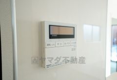 同仕様写真。キッチン横からボタンひとつで操作が楽々。