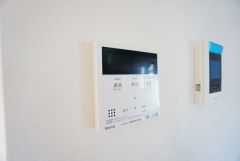 キッチン横からボタンひとつで操作が楽々。