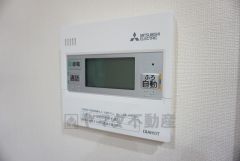 同仕様写真。キッチン横からボタンひとつで操作が楽々。