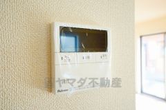 キッチン横からボタンひとつで操作が楽々。