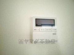 キッチン横からボタンひとつで操作が楽々。