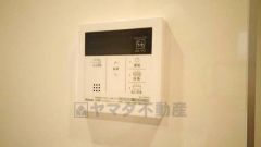 キッチン横からボタンひとつで操作が楽々。