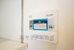 キッチン横からボタンひとつで操作が楽々。