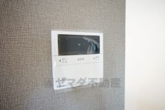 キッチン横からボタンひとつで操作が楽々。