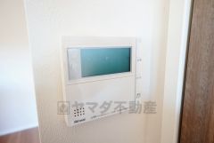 キッチン横からボタンひとつで操作が楽々。