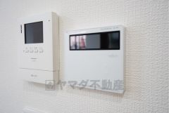 キッチン横からボタンひとつで操作が楽々。